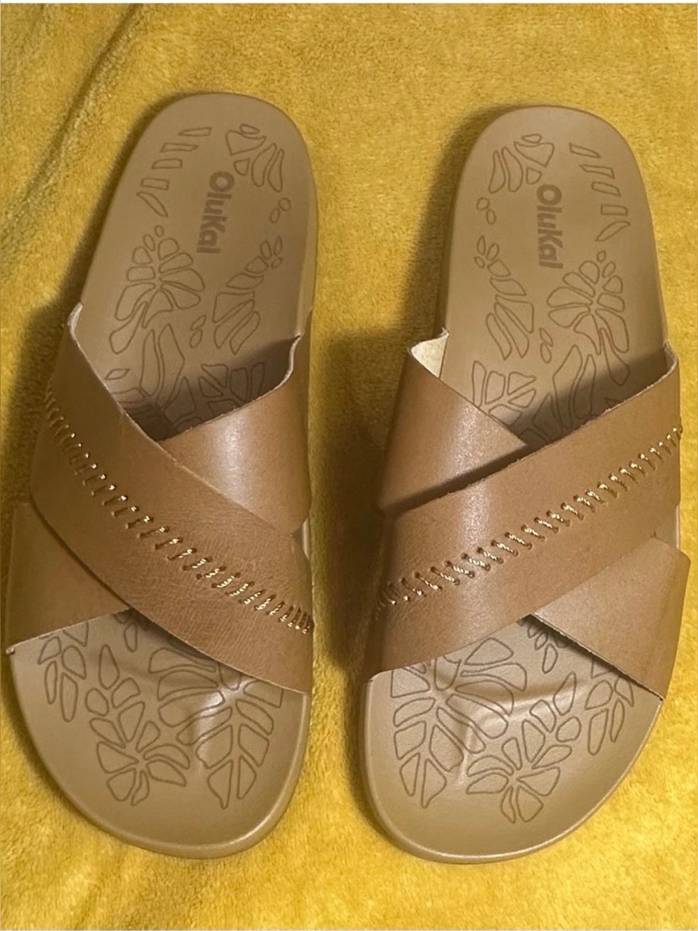 OluKai Women’s Brown Leather Slide Sandals. New without tags. Women’s size 9